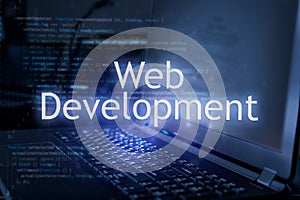 Web development inscription against laptop and code background. Learn web development programming language, computer courses,