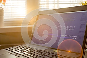 Web development phrase ASCII art inside HTML code. Web developer workplace in sunset lights