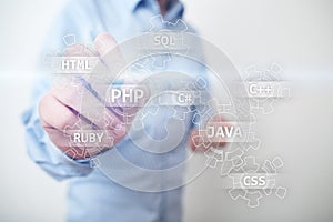 Web development tools concept on virtual screen. Programming language and scripts. PHP, SQL, HTML, Java and others.