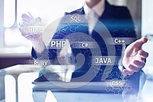 Web development tools concept on virtual screen. Programming language and scripts. PHP, SQL, HTML, Java and others.