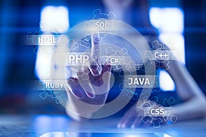 Web development tools concept on virtual screen. Programming language and scripts. PHP, SQL, HTML, Java and others.
