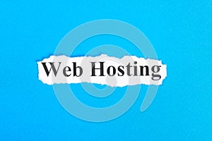 web hosting text on paper. Word web hosting on torn paper. Concept Image