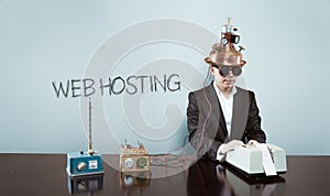 Web hosting text with vintage businessman at office