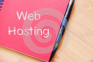 Web hosting write on notebook