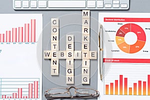 Web marketing concept with letters on cubes