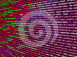 Web site codes on computer monitor. Developer working on program codes in office. Abstract source code background. Data encryption