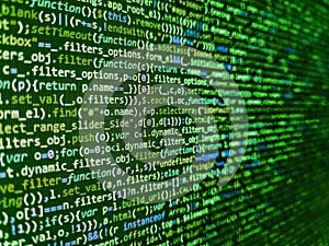 Web site codes on computer monitor. Digital abstract bits data stream, cyber pattern digital background. Notebook closeup photo.