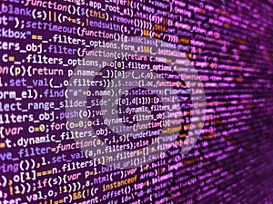 Web site codes on computer monitor. Digital abstract bits data stream, cyber pattern digital background. Notebook closeup photo.