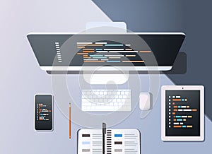 Web site design development program code programming concept top angle view desktop computer monitor tablet smartphone