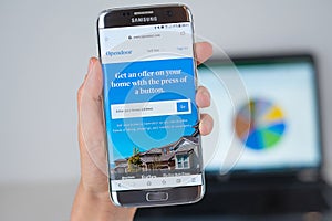 Web site of Opendoor company on phone screen