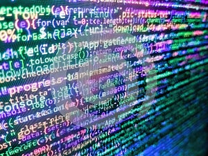 Web software. Blurred screen with selective focus. Programming code abstract company office. Application web source code on