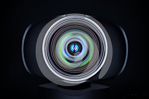 Webcam lens with coloured reflections