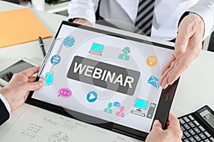 Webinar concept on a clipboard