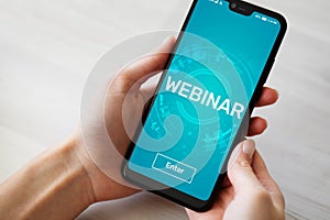 Webinar E-learning Online Training Coaching Education concept on mobile phone screen.