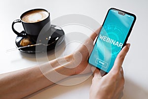 Webinar E-learning Online Training Coaching Education concept on mobile phone screen.