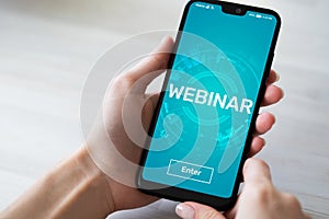 Webinar E-learning Online Training Coaching Education concept on mobile phone screen.