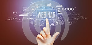 Webinar theme with hand pressing a button