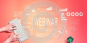 Webinar theme with person using computer keyboard