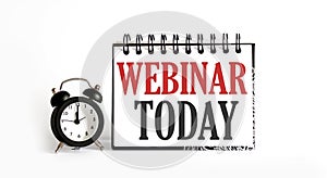 Webinar Today notepad writing on the white background with alarm clock