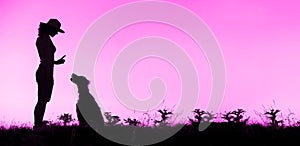 Website banner of dog training silhouette in pink