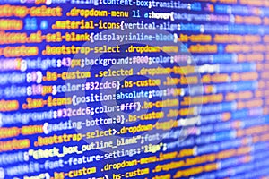 Website codes on computer monitor. Coding hacker concept. Computer script typing work.