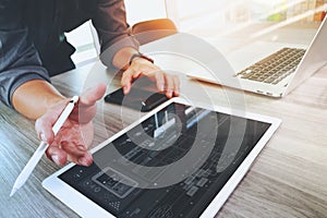 Website designer working digital tablet and computer laptop