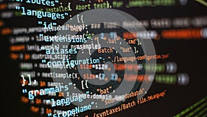 Website development. Developer working on program codes in office. Computer program. Programmer workplace. Programming code.
