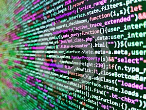 Website development. Software background technology. Simple website HTML code with colourful tags in browser view on dark