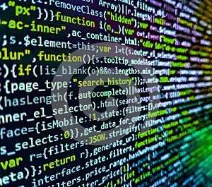 Website development. Software developer programming code on computer monitor. Shallow Depth of Field effect. Template of website,