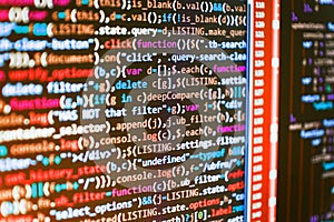 Website HTML Code on the Laptop Display Closeup Photo.