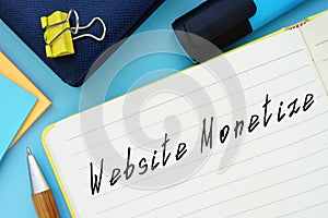 Website Monetize inscription on the sheet