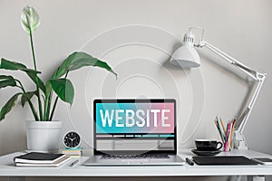 Website or web design concepts with text on computer laptop and accessories on worktable.creativity and development