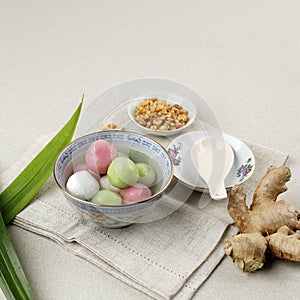 Wedang Ronde or Tangyuan, Glutinous Sweet Balls, Served in Ginger Syrup and Tossed with Roasted Peanuts