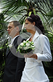 Wedded couple in garden photo