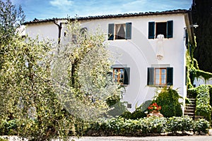 Weddign dress hanging in the window. Beautiful Italian villa. Villa Bordoni