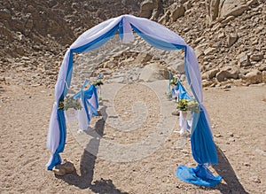 Wedding aisle setup in a remote arid desert environment