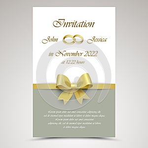 Wedding announcement with gold ribbon and rings