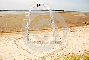 Wedding arch on beach