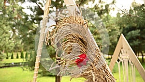 Wedding arch for the ceremony in a rustic style.