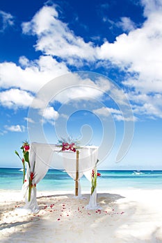 Wedding arch with flowers on beach