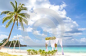 Wedding arch and set up on beach, tropical outdoor wedding