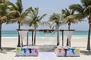 Wedding arch and set up on tropical beach paradise - wedding and honeymoon concept