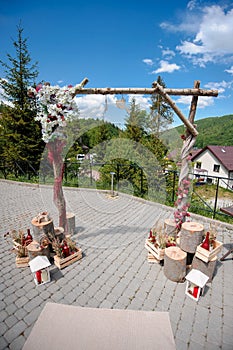 Wedding archway with flowers arranged for a wedding ceremony