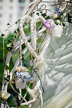 Wedding archway with flowers arranged for a wedding ceremony