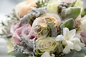 Wedding autumn bouquet with wedding rings