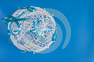 Wedding ball on a blue background of threads