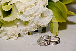 Wedding bands with white roses