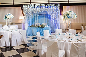 Wedding banquet Hall. Empty festive tables in a restaurant.