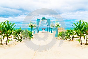 Wedding on the beach . Wedding arch decorated with flowers