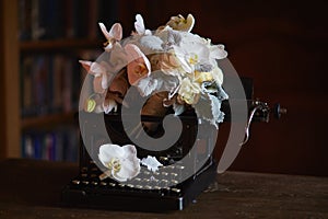 Wedding boquet and old typewriter